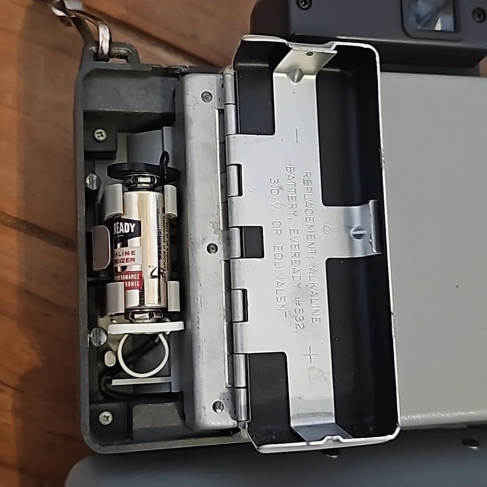Vintage Polaroid automatic 104 land camera with beautiful strap